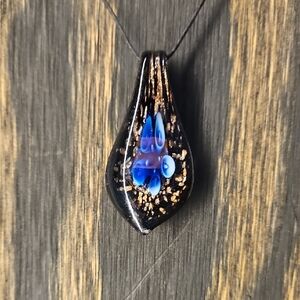 Glass Blue Flower With Gold Specs Teardrop Pendant 20 Inch To 30 Inches